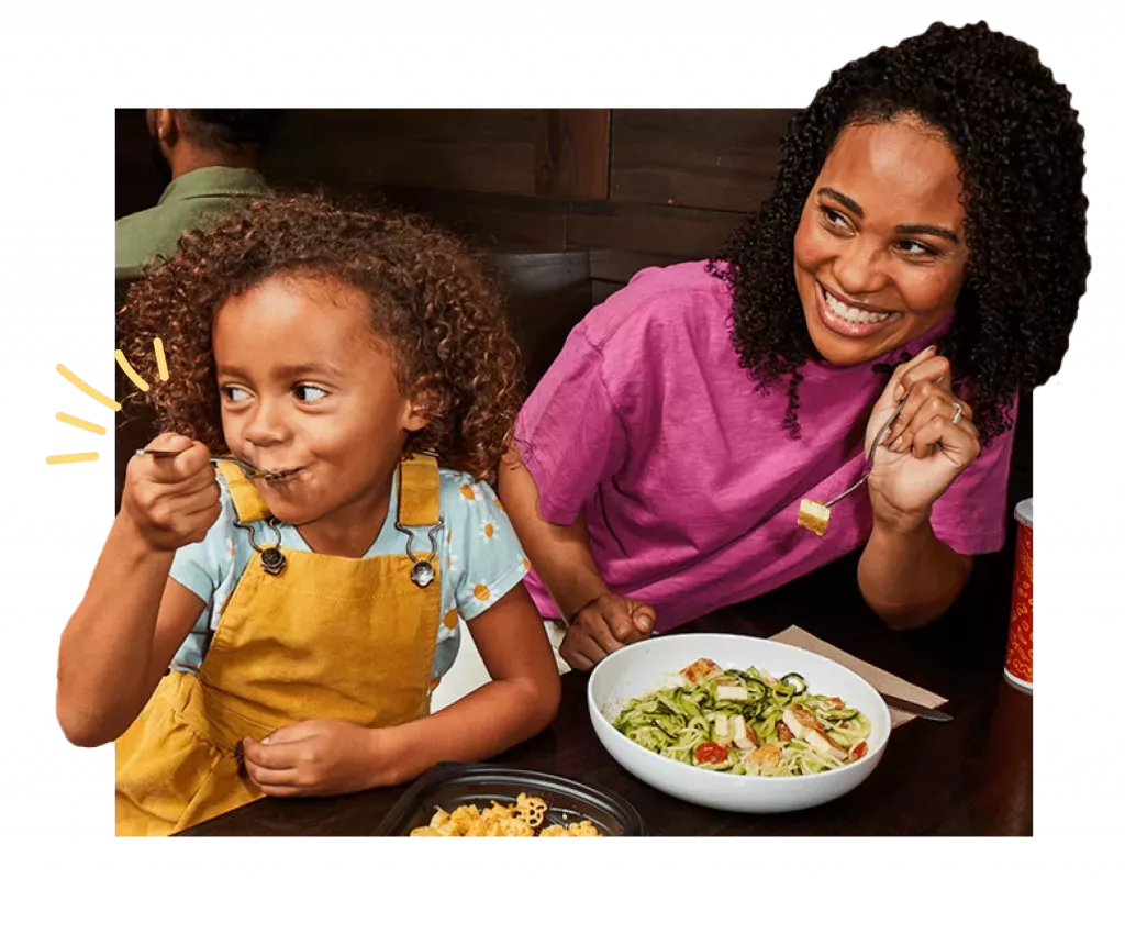 Mother and Daughter eating a meal