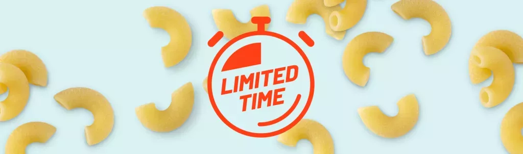 Background image of elbow noodles with an image tag of a stopwatch with the words Limited Time in the middle.