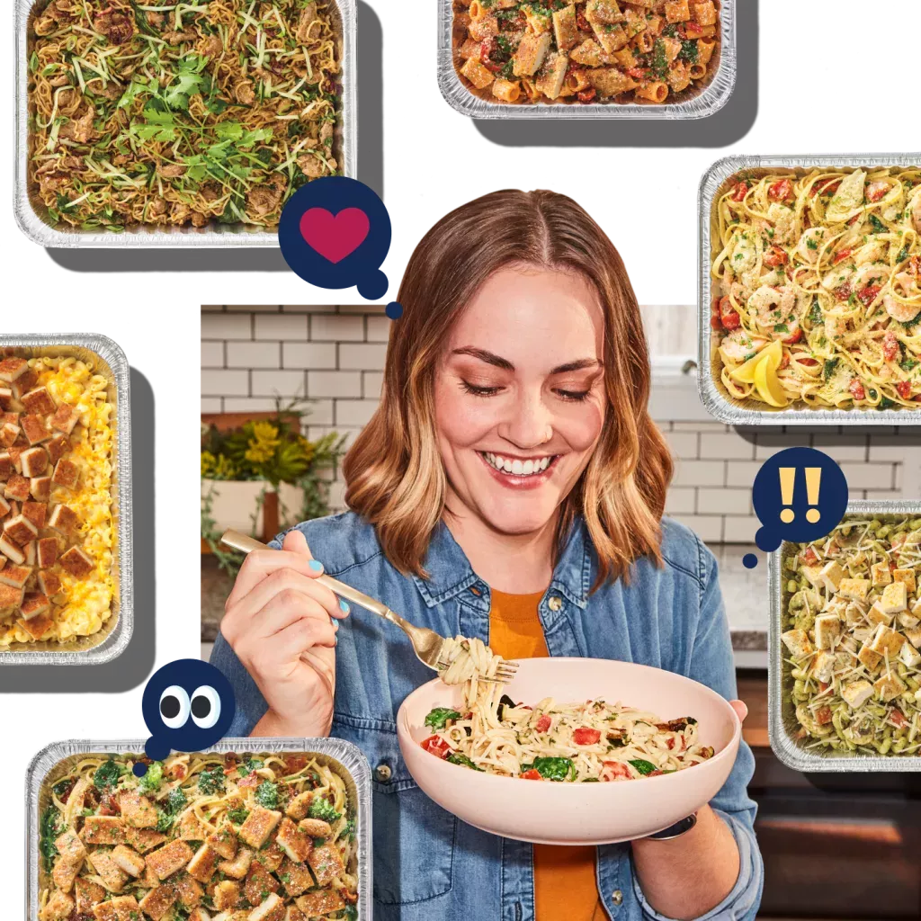 Noodles &amp; Company customer enjoying a serving of noodles with multiple catering options in pans surrounding the customer.
