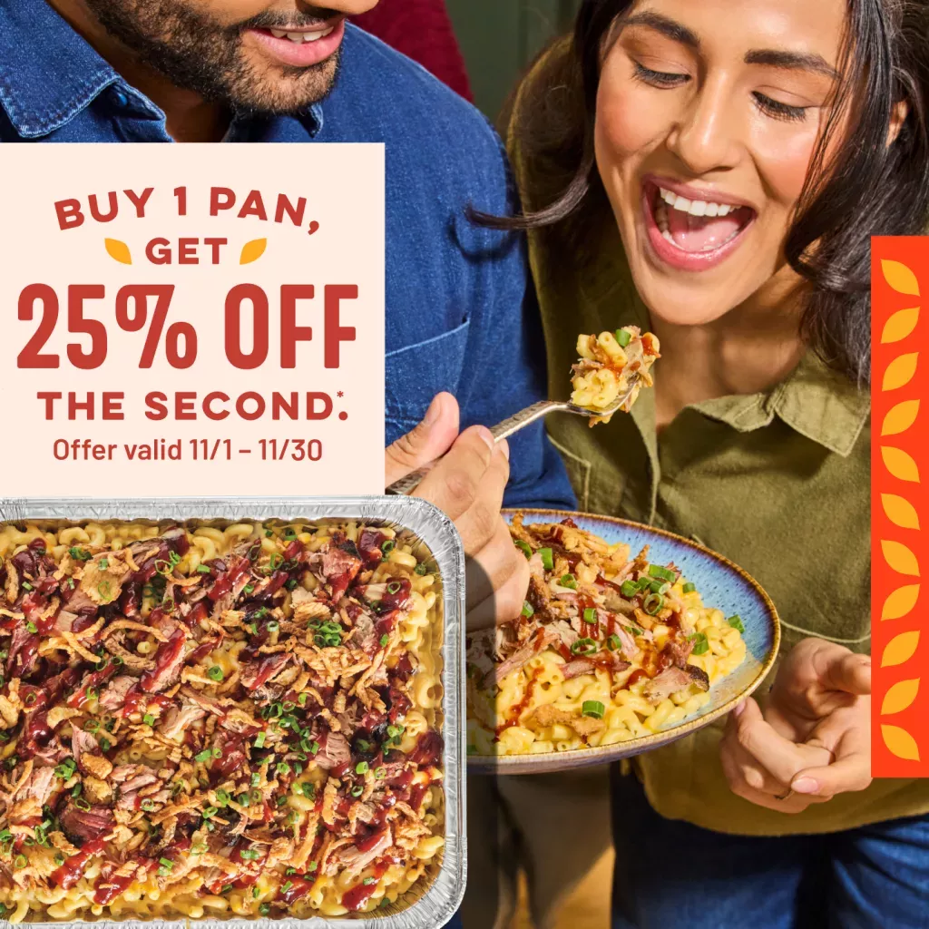 Buy 1 pan, Get 25% off the second. Offer valid 11/1-11/30. Catering pan of Pulled Pork Mac. Customers enjoying a serving of pulled pork mac.