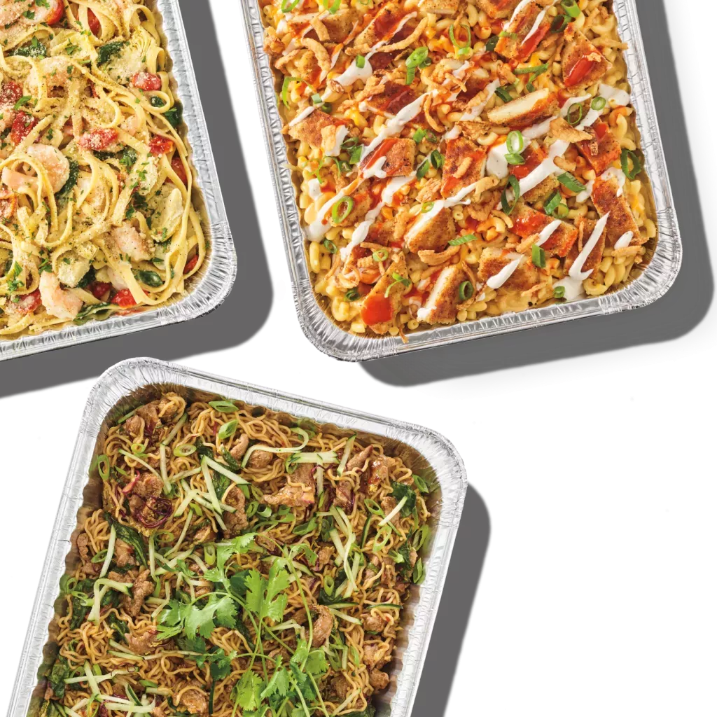 Noodles &amp; Company catering pan offerings of Buffalo Chicken Ranch Mac, Spicy Korean Steak Noodles &amp; Lemon Garlic Shrimp Scampi