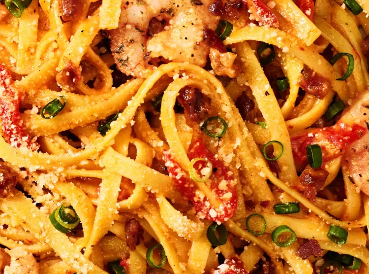 Close up detail of cajun shrimp fettuccine dish