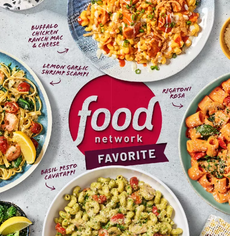 Food Network Favorite. Buffalo Chicken Ranch Mac and Cheese on a white plate, Rigatoni Rosa on a green plate with a side of grated parmesan cheese, Basil Pesto Cavatappi on a white plate, a side of lemon parmesan broccoli, and Lemon Garlic Shrimp Scampi on a blue plate.