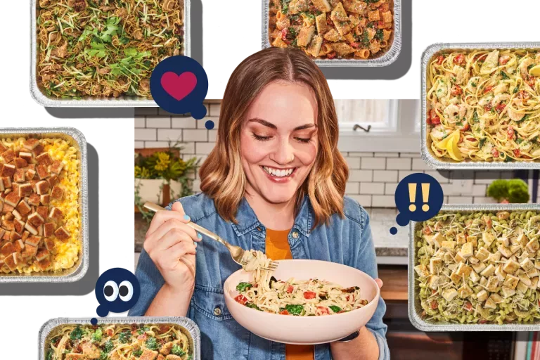 Noodles &amp; Company customer enjoying a serving of noodles with multiple catering options in pans surrounding the customer.
