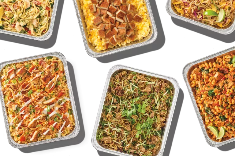 Six different Noodles &amp; Company catering pan offerings