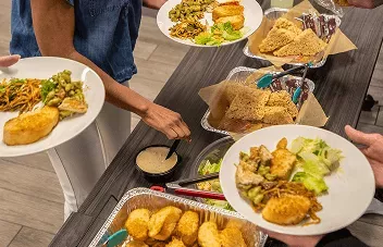 Noodles Catering spread at an office gathering.