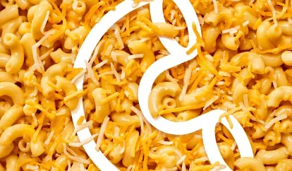 Creamy Cheddar Mac and Cheese with a white noodles logo elbow noodle